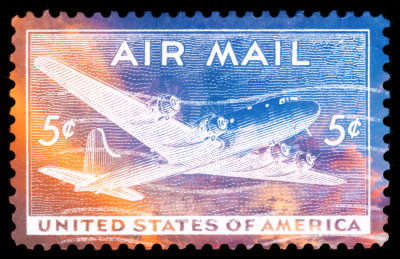 <br/>
Photomanipulated vintage <b><u><a href='http://freestock.ca/vintage_heraldry_g88-red_dc4_skymaster_stamp__usa_circa_1946_p2483.html' target='_blank'>Air Mail Stamp</a></u></b> combined with a photo I took of <b><u><a href='http://freestock.ca/skies_space_g61-sunset_clouds_p2067.html' target='_blank'>vibrant sunset clouds</a></u></b>, all isolated on a black background.<br><br>

Available at web resolution under a Creative Commons license on condition of including credits and a link back to the <b><u><a href='http://freestock.ca/stamps_g102-vintage_air_mail_stamp__vibrant_sunset_clouds_p4825.html' title='Vibrant US Air Mail Stamp' target='_blank'>same image</a></u></b> from my sister website <b><u><a href='http://freestock.ca' title='freestock.ca' target='_blank'>freestock.ca</a></u></b>. For purchasing a license of this image at much higher resolution or without credit requirements, please feel free to <b><u><a href='http://somadjinn.com/theme-options/contact/' title='contact' target='_blank'>contact me</a></u></b>, I am open to discuss fair pricing for using my work in a wide variety of applications.
