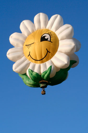 <br />
Hot air balloon in the shape of a smiling daisy.
<br /><br />
Available at web resolution under a Creative Commons license on condition of including credits and a link back to the <b><u><a href='http://freestock.ca/air_balloons_g75-smiling_daisy_p763.html' title='Smiling Daisy' target='_blank'>same image</a></u></b> from my sister website <b><u><a href='http://freestock.ca' title='freestock.ca' target='_blank'>freestock.ca</a></u></b>. For purchasing a license of this image at much higher resolution or without credit requirements, please feel free to <b><u><a href='http://somadjinn.com/theme-options/contact/' title='contact' target='_blank'>contact me</a></u></b>, I am open to discuss fair pricing for using my work in a wide variety of applications.