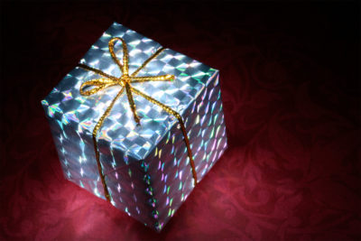 <br />
Long exposure close-up of a small gift box illuminated with a small flashlight for the glowing effect. 
<br /><br />
Available at web resolution under a Creative Commons license on condition of including credits and a link back to the <b><u><a href='http://freestock.ca/objects_g58-glowing_gift_box_p1569.html' title='Glowing Gift Box' target='_blank'>same image</a></u></b> from my sister website <b><u><a href='http://freestock.ca' title='freestock.ca' target='_blank'>freestock.ca</a></u></b>. For purchasing a license of this image at much higher resolution or without credit requirements, please feel free to <b><u><a href='http://somadjinn.com/theme-options/contact/' title='contact' target='_blank'>contact me</a></u></b>, I am open to discuss fair pricing for using my work in a wide variety of applications.
