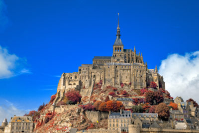 <br />
Old world castle from Mont Saint-Michel in Normandy, France. HDR composite from multiple exposures, with warm autumn tones for a more surreal atmosphere and stronger contrast against the blue sky.
<br /><br />
Available at web resolution under a Creative Commons license on condition of including credits and a link back to the <b><u><a href='http://freestock.ca/buildings_landmarks_g30-mont_saintmichel_castle__warm_autumn_hdr_p3893.html' title='Mont Saint-Michel' target='_blank'>same image</a></u></b> from my sister website <b><u><a href='http://freestock.ca' title='freestock.ca' target='_blank'>freestock.ca</a></u></b>. For purchasing a license of this image at much higher resolution or without credit requirements, please feel free to <b><u><a href='http://somadjinn.com/theme-options/contact/' title='contact' target='_blank'>contact me</a></u></b>, I am open to discuss fair pricing for using my work in a wide variety of applications.