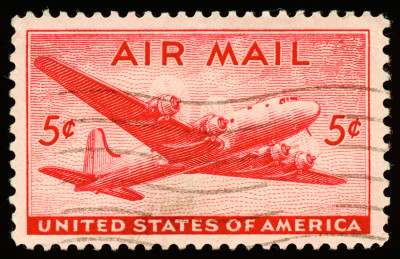 <br />
High resolution scan of a vintage stamp from the United States. This one in particular features the Douglas DC-4 airplane (otherwise known as the DC4 Skymaster), and to the best of my knowledge it was issued around the year 1946.
<br /><br />
Available at web resolution under a Creative Commons license on condition of including credits and a link back to the <b><u><a href='http://freestock.ca/vintage_heraldry_g88-red_dc4_skymaster_stamp__usa_circa_1946_p2483.html' title='American Air Mail Stamp' target='_blank'>same image</a></u></b> from my sister website <b><u><a href='http://freestock.ca' title='freestock.ca' target='_blank'>freestock.ca</a></u></b>. For purchasing a license of this image at much higher resolution or without credit requirements, please feel free to <b><u><a href='http://somadjinn.com/theme-options/contact/' title='contact' target='_blank'>contact me</a></u></b>, I am open to discuss fair pricing for using my work in a wide variety of applications.