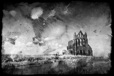 <br />
Mixed media photomanipulation combining a photo of Whitby Abbey and an abstract acrylic texture with custom vignette frame. Processed in black & white for a more aged appearance. 
<br /><br />
Source images generously contributed by <b><u><a href='http://kippa2001.deviantart.com/' title='Michael D. Beckwith' target='_blank'>Michael D. Beckwith</a></u></b> who took the <b><u><a href='http://freestock.ca/buildings_landmarks_g30-whitby_abbey_p3701.html' title='Whitby Abbey' target='_blank'>Whitby Abbey</a></u></b> photo and <b><u><a href='http://theparasiticbandaid.deviantart.com/' title='Lara Mukahirn' target='_blank'>Lara Mukahirn</a></u></b> who painted the <b><u><a href='http://freestock.ca/grunge_g71-abstract_painting__tintype_grunge_texture_p2933.html' title='Acrylic Texture' target='_blank'>acrylic texture</a></u></b>. Feel free to click on their names to visit more of their wonderful works from deviantART. 
<br /><br />
Available at web resolution under a Creative Commons license on condition of including credits and a link back to the <b><u><a href='http://freestock.ca/mixed_media_vexels_g100-whitby_abbey__black_white_acrylic_grunge_p3994.html' title='Whitbey Abbey - Vintage Acrylic Grunge' target='_blank'>same image</a></u></b> from my sister website <b><u><a href='http://freestock.ca' title='freestock.ca' target='_blank'>freestock.ca</a></u></b>. For purchasing a license of this image at much higher resolution or without credit requirements, please feel free to <b><u><a href='http://somadjinn.com/theme-options/contact/' title='contact' target='_blank'>contact me</a></u></b>, I am open to discuss fair pricing for using my work in a wide variety of applications.