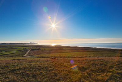 <br />
Coastal scenery from Point Reyes National Seashore located north of San Francisco, California (USA). HDR composite from multiple exposures with the bright sun in the shape of a starburst.
<br /><br />
Available at web resolution under a Creative Commons license on condition of including credits and a link back to the <b><u><a href='http://freestock.ca/americas_g98-solar_sentinel_of_point_reyes__hdr_p4303.html' title='Solar Sentinel of Point Reyes' target='_blank'>same image</a></u></b> from my sister website <b><u><a href='http://freestock.ca' title='freestock.ca' target='_blank'>freestock.ca</a></u></b>. For purchasing a license of this image at much higher resolution or without credit requirements, please feel free to <b><u><a href='http://somadjinn.com/theme-options/contact/' title='contact' target='_blank'>contact me</a></u></b>, I am open to discuss fair pricing for using my work in a wide variety of applications.